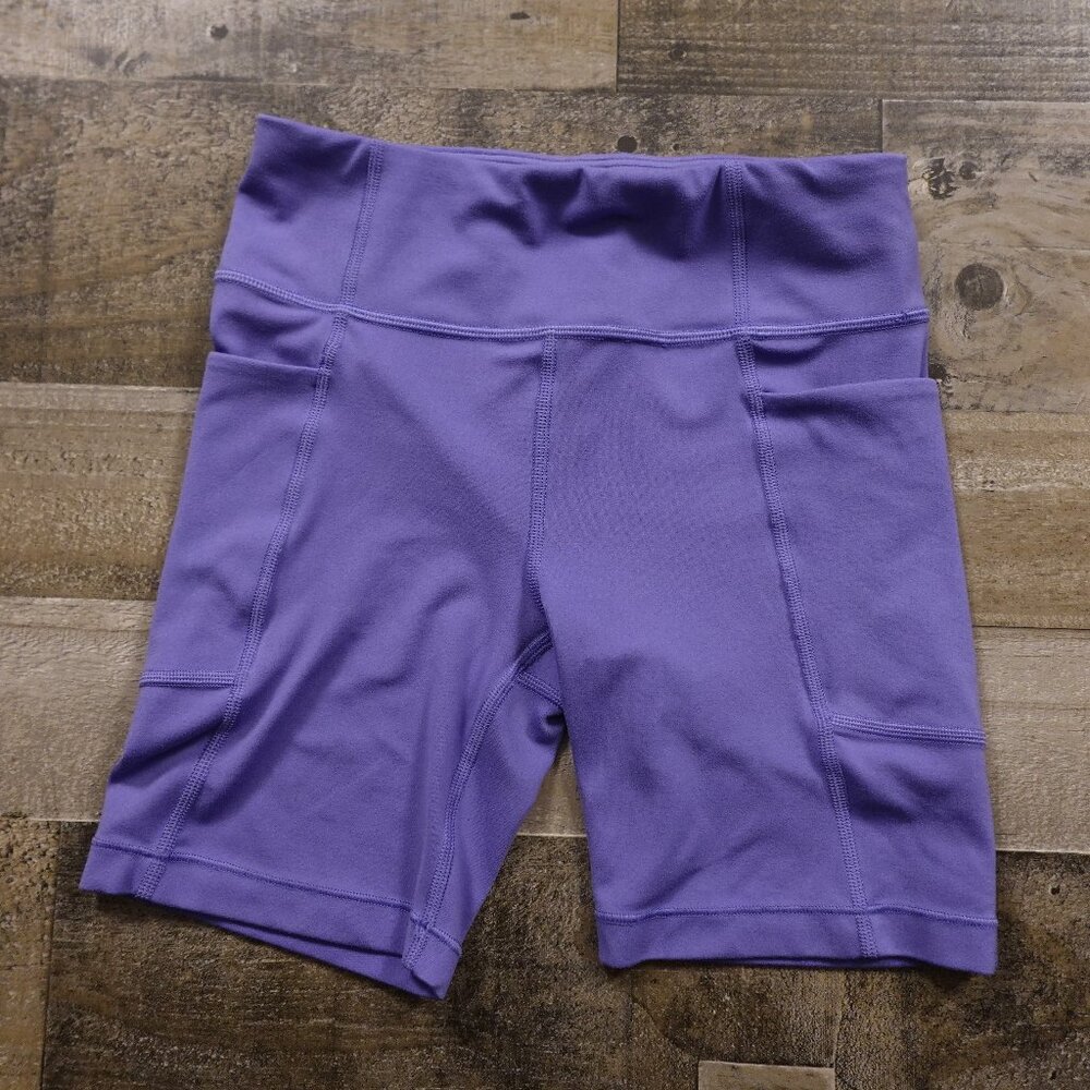Athleta Girl Stash your Treasures Bike Shorts girls' large (12) purple